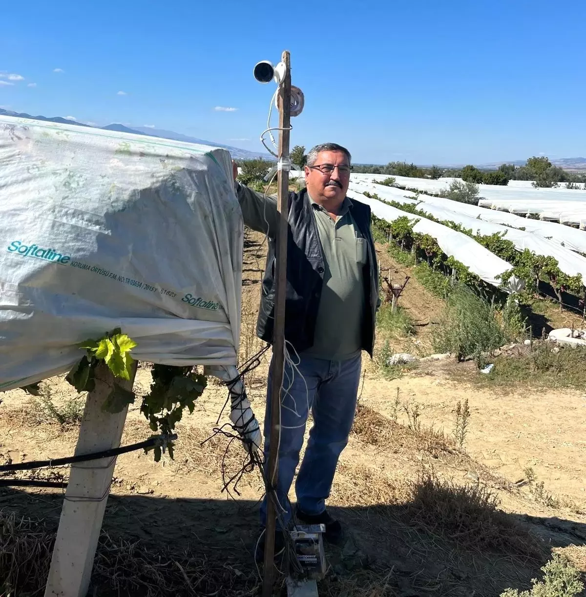 uzum bagini kamera ile koruyor eah3ig58